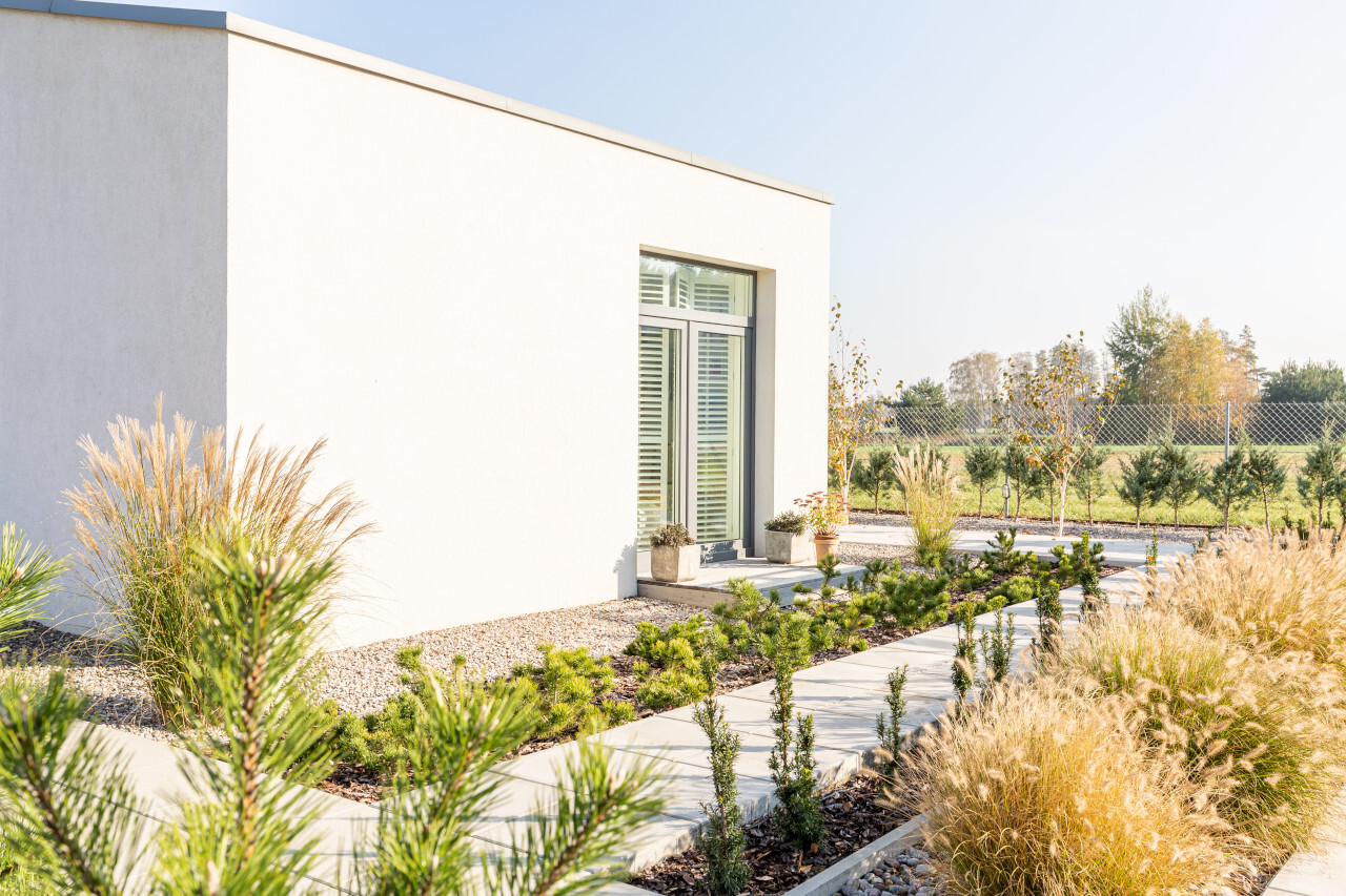 Maison moderne avec jardin paysage